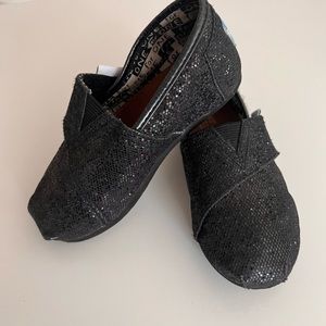 Tom’s black sparkle